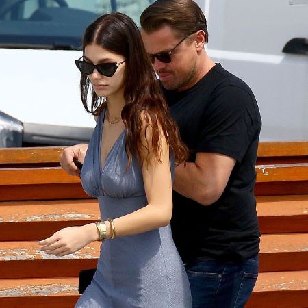 Camila and Leonardo walking together